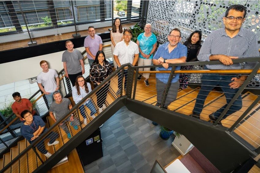 research team at the Wyss Institute led by Samir Mitragotri (on the far right) and Michael Super (left of Mitragotri)