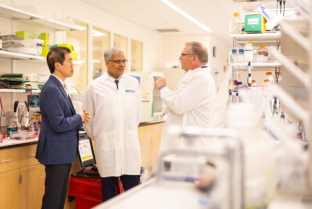 NIH Director Jay Bhattacharya (center) meeting with Broad researcher David Liu (left) and institute director Todd Golub (right)