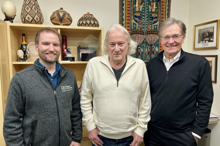 David Collins, PhD, (left) and Ragon Founding Director Bruce Walker, MD, (right) pictured meeting a research participant