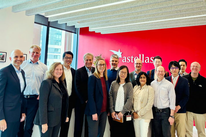 MIT researchers standing in the astellas hq